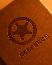 Colony Issued Research Notebook
